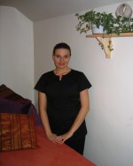 Anna Jane Gatland standing beside the treatment couch in her room at Freedom Therapies